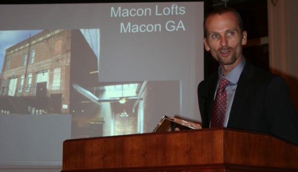Bryan Nichols, developer of the Warehouse Lofts accepting his Preservation's Best award.